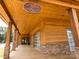 Wood building exterior with covered porch with restaurant, Lakeview Grill & Tavern, signage at 5501 Two Iron Dr, Matthews, NC 28104