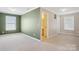 Spacious bedroom with large closets, adjoining bathroom, and a window for ample light at 616 Smokehouse Ln, Albemarle, NC 28001