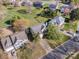 An aerial view showcases a neighborhood's attractive homes and well-manicured lawns, highlighting its inviting curb appeal at 6720 Neuhoff Ln, Charlotte, NC 28269