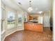 Eat-in kitchen area with large windows offering plenty of natural light at 6720 Neuhoff Ln, Charlotte, NC 28269