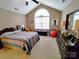 Spacious bedroom featuring a queen bed, a large window, and neutral wall color at 810 Wynnshire Dr # D, Hickory, NC 28601