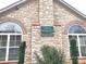 Close up of clubhouse exterior signage, including swimming pool and information center at 810 Wynnshire Dr # D, Hickory, NC 28601