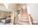 Carpeted staircase leading to the second floor landing in a home with neutral paint colors at 9131 Strattonville Ct, Huntersville, NC 28078