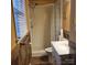 Cozy bathroom with wood accents, shower, and vanity at 1033 College Ave, Shelby, NC 28152