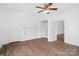 Neutral bedroom featuring hardwood floors and ample closet space at 1111 W 4Th Ave, Gastonia, NC 28052