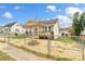 Cozy home with fenced yard, front porch and some landscaping at 1111 W 4Th Ave, Gastonia, NC 28052