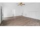 Open-concept living room with hardwood floors and natural light at 1111 W 4Th Ave, Gastonia, NC 28052