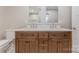 Bathroom with double sink vanity featuring a white countertop and updated cabinets at 1114 University Dr, Lancaster, SC 29720