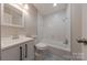 This bathroom features a shower/tub combo and eye-catching patterned floor tile at 1114 University Dr, Lancaster, SC 29720