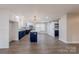 Kitchen pantry with a sliding barn door and many shelves for storage at 1114 University Dr, Lancaster, SC 29720