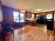 Kitchen with dining area features wood cabinets, a breakfast bar, and new flooring at 1168 Mcclain Rd, Hiddenite, NC 28636