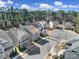 An aerial view of a neighborhood with mature trees and manicured lawns at 124 Helton Ln, Fort Mill, SC 29708