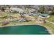 An aerial view of the neighborhood playground and surrounding pond at 130 Water Oak Dr, Pineville, NC 28134