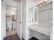 Bathroom with vanity and patterned floor tile, adjacent to large bedroom at 130 Water Oak Dr, Pineville, NC 28134