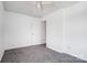 Neutral bedroom with carpet, ceiling fan and natural light, and closet space at 130 Water Oak Dr, Pineville, NC 28134