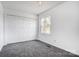 Neutral bedroom with carpet, double closets, ceiling fan and natural light at 130 Water Oak Dr, Pineville, NC 28134