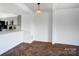 Bright kitchen featuring new cabinets, herringbone floors, and modern lighting, creating an inviting space at 130 Water Oak Dr, Pineville, NC 28134