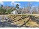 Charming single-story home with a welcoming front porch and a well-maintained yard at 1339 Hill St, Albemarle, NC 28001