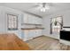 Kitchen with white cabinets, subway tile backsplash, and butcher block countertop at 1339 Hill St, Albemarle, NC 28001