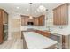 Modern kitchen featuring an island, stainless steel appliances, and wood cabinetry at 1347 Lightwood Dr, Matthews, NC 28105