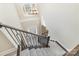 View from the top of the staircase showcasing the home's entry and layout at 1347 Lightwood Dr, Matthews, NC 28105