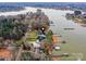 Breathtaking aerial view of a lakeside home and its surroundings on Lake Norman at 144 Morgan Bluff Rd, Mooresville, NC 28117