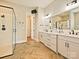 Elegant bathroom featuring dual vanity, large shower, tile floors and a modern design at 144 Morgan Bluff Rd, Mooresville, NC 28117