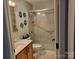 Bathroom featuring a vanity with stylish mirrors and a glass enclosed shower with safety bar at 155 Rivercliff Dr, Stony Point, NC 28678