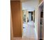 Hallway with tiled flooring leading to the main living areas of the home at 1640 Winthrop Ln, Monroe, NC 28110