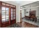 Dining room with hardwood flooring, ornate lighting, and ample seating at 17201 Royal Court Dr, Davidson, NC 28036