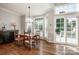 Breakfast nook with plantation shutters, hardwood floors and natural lighting at 17201 Royal Court Dr, Davidson, NC 28036