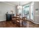 Breakfast nook with plantation shutters, hardwood floors and natural lighting at 17201 Royal Court Dr, Davidson, NC 28036