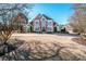 Charming brick home with well-maintained landscaping and a spacious front yard at 17201 Royal Court Dr, Davidson, NC 28036