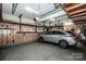 Well-organized garage featuring ample storage and a modern SUV at 17201 Royal Court Dr, Davidson, NC 28036