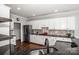 Spacious kitchen featuring granite countertops, stainless appliances, and white cabinetry at 17201 Royal Court Dr, Davidson, NC 28036