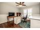 Comfortable office space with a ceiling fan, natural light, and stylish decor at 17201 Royal Court Dr, Davidson, NC 28036