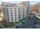 Aerial view of a large condo building with parking at 211 Heritage Blvd # 612, Fort Mill, SC 29715