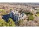 Aerial view of a condo building surrounded by parking and dense forest at 211 Heritage Blvd # 612, Fort Mill, SC 29715