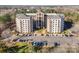 Attractive multi-story apartment building with balconies and plenty of parking in a wooded area at 211 Heritage Blvd # 612, Fort Mill, SC 29715