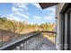 A balcony overlooking a parking lot surrounded by trees at 211 Heritage Blvd # 612, Fort Mill, SC 29715