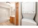 A bathroom featuring a shower and tub combination and a stackable washer and dryer at 211 Heritage Blvd # 612, Fort Mill, SC 29715