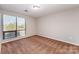 Bright bedroom with carpet, one large window with blinds and neutral wall paint at 211 Heritage Blvd # 612, Fort Mill, SC 29715