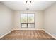 A bedroom featuring neutral carpeting and a large window that offers plenty of natural light at 211 Heritage Blvd # 612, Fort Mill, SC 29715