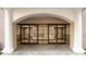 Condo entrance with glass doors and visible mailboxes, under an archway with brick accents at 211 Heritage Blvd # 612, Fort Mill, SC 29715