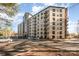 A modern condominium with large windows and small balconies on a sunny day with ample parking at 211 Heritage Blvd # 612, Fort Mill, SC 29715
