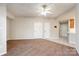 Living room with carpet flooring, neutral walls, a ceiling fan, and doors to other rooms at 211 Heritage Blvd # 612, Fort Mill, SC 29715
