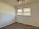 Comfortable bedroom with a ceiling fan and window at 2210 Milton Rd, Charlotte, NC 28215