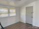 Bright and airy room with large windows and neutral flooring at 2210 Milton Rd, Charlotte, NC 28215