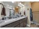 Bathroom with a double sink vanity, large mirror, modern fixtures, and great lighting at 2375 Ellison Cir, Lancaster, SC 29720