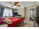 Bedroom featuring a ceiling fan, large window with blinds, and neutral-toned walls at 2375 Ellison Cir, Lancaster, SC 29720